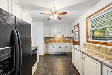 All-brick ranch on a picturesque Mayflower Park street, just two on Elizabeth Manor Golf and Country Club in Virginia - for sale on GolfHomes.com, golf home, golf lot