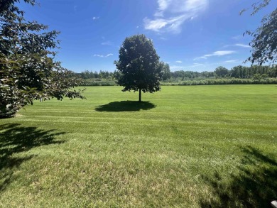 Ranch style stand-alone condo overlooking peaceful hole 4 of on Saddle Ridge Golf Club in Wisconsin - for sale on GolfHomes.com, golf home, golf lot