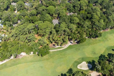 This lovingly maintained low-country style home is set back from on The Seabrook Island Club in South Carolina - for sale on GolfHomes.com, golf home, golf lot