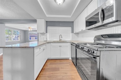 Welcome to 12401 Yorktown Lane, Bayonet Point, FL 34667. Step on Beacon Woods Golf Club in Florida - for sale on GolfHomes.com, golf home, golf lot