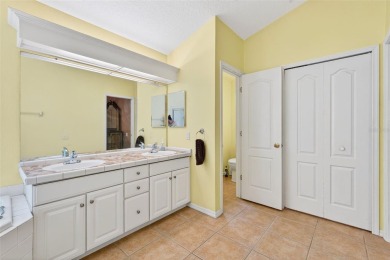 Welcome to 17728 Long Ridge Road, a beautifully maintained on Hunters Green Country Club in Florida - for sale on GolfHomes.com, golf home, golf lot