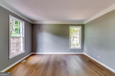 Embrace luxury living at its finest in this fully renovated on Canongate At Olde Atlanta Golf Club in Georgia - for sale on GolfHomes.com, golf home, golf lot
