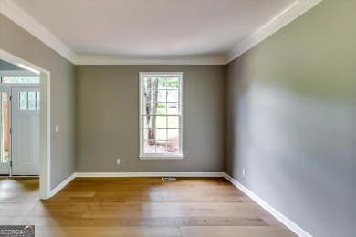 Embrace luxury living at its finest in this fully renovated on Canongate At Olde Atlanta Golf Club in Georgia - for sale on GolfHomes.com, golf home, golf lot