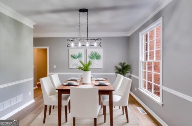 Embrace luxury living at its finest in this fully renovated on Canongate At Olde Atlanta Golf Club in Georgia - for sale on GolfHomes.com, golf home, golf lot