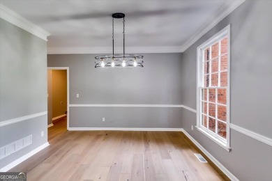 Embrace luxury living at its finest in this fully renovated on Canongate At Olde Atlanta Golf Club in Georgia - for sale on GolfHomes.com, golf home, golf lot