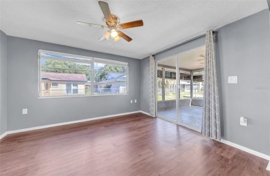 Welcome to 12401 Yorktown Lane, Bayonet Point, FL 34667. Step on Beacon Woods Golf Club in Florida - for sale on GolfHomes.com, golf home, golf lot