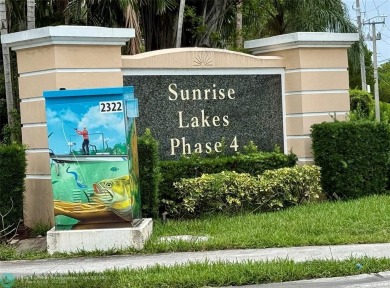 Beautiful Corner Unit with Golf Course View in a senior living on Sunrise Lakes Phase III in Florida - for sale on GolfHomes.com, golf home, golf lot