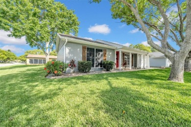 Welcome to 12401 Yorktown Lane, Bayonet Point, FL 34667. Step on Beacon Woods Golf Club in Florida - for sale on GolfHomes.com, golf home, golf lot