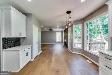 Embrace luxury living at its finest in this fully renovated on Canongate At Olde Atlanta Golf Club in Georgia - for sale on GolfHomes.com, golf home, golf lot