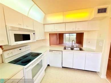 Beautiful Corner Unit with Golf Course View in a senior living on Sunrise Lakes Phase III in Florida - for sale on GolfHomes.com, golf home, golf lot