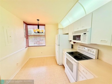 Beautiful Corner Unit with Golf Course View in a senior living on Sunrise Lakes Phase III in Florida - for sale on GolfHomes.com, golf home, golf lot