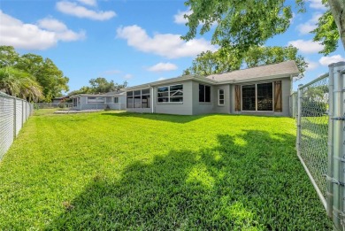 Welcome to 12401 Yorktown Lane, Bayonet Point, FL 34667. Step on Beacon Woods Golf Club in Florida - for sale on GolfHomes.com, golf home, golf lot