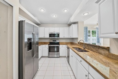 Welcome to 17728 Long Ridge Road, a beautifully maintained on Hunters Green Country Club in Florida - for sale on GolfHomes.com, golf home, golf lot