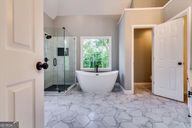 Embrace luxury living at its finest in this fully renovated on Canongate At Olde Atlanta Golf Club in Georgia - for sale on GolfHomes.com, golf home, golf lot
