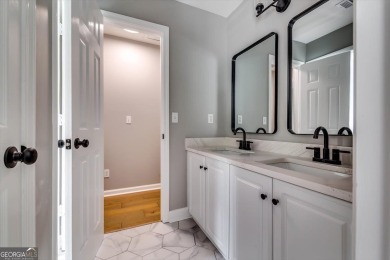 Embrace luxury living at its finest in this fully renovated on Canongate At Olde Atlanta Golf Club in Georgia - for sale on GolfHomes.com, golf home, golf lot
