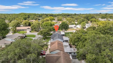 Welcome to 12401 Yorktown Lane, Bayonet Point, FL 34667. Step on Beacon Woods Golf Club in Florida - for sale on GolfHomes.com, golf home, golf lot