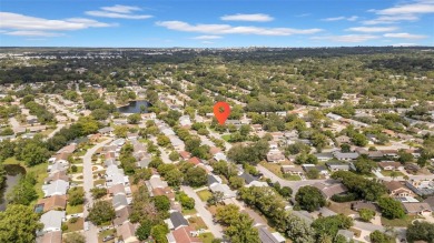 Welcome to 12401 Yorktown Lane, Bayonet Point, FL 34667. Step on Beacon Woods Golf Club in Florida - for sale on GolfHomes.com, golf home, golf lot
