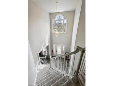 Step out of your home onto the 9th fairway.  This beautiful home on Riverfront Golf Club in Virginia - for sale on GolfHomes.com, golf home, golf lot