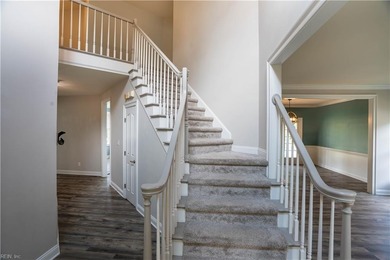 Step out of your home onto the 9th fairway.  This beautiful home on Riverfront Golf Club in Virginia - for sale on GolfHomes.com, golf home, golf lot