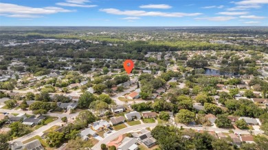 Welcome to 12401 Yorktown Lane, Bayonet Point, FL 34667. Step on Beacon Woods Golf Club in Florida - for sale on GolfHomes.com, golf home, golf lot