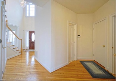 Step out of your home onto the 9th fairway.  This beautiful home on Riverfront Golf Club in Virginia - for sale on GolfHomes.com, golf home, golf lot