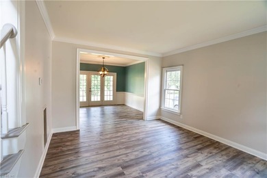 Step out of your home onto the 9th fairway.  This beautiful home on Riverfront Golf Club in Virginia - for sale on GolfHomes.com, golf home, golf lot