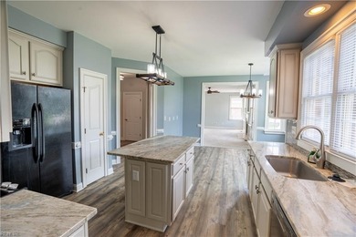 Step out of your home onto the 9th fairway.  This beautiful home on Riverfront Golf Club in Virginia - for sale on GolfHomes.com, golf home, golf lot