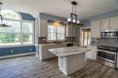 Step out of your home onto the 9th fairway.  This beautiful home on Riverfront Golf Club in Virginia - for sale on GolfHomes.com, golf home, golf lot