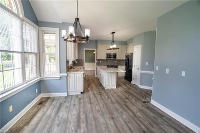 Step out of your home onto the 9th fairway.  This beautiful home on Riverfront Golf Club in Virginia - for sale on GolfHomes.com, golf home, golf lot