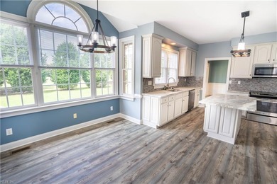 Step out of your home onto the 9th fairway.  This beautiful home on Riverfront Golf Club in Virginia - for sale on GolfHomes.com, golf home, golf lot