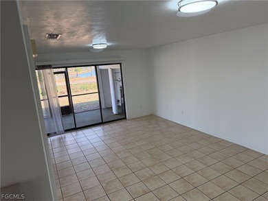 Solid concrete block duplex featuring two 2-bedroom, 2-bath on Estero Country Club in Florida - for sale on GolfHomes.com, golf home, golf lot