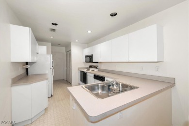 Welcome to this 2-bedroom, 2-bathroom condo with a 1-car garage on Gateway Golf and Country Club in Florida - for sale on GolfHomes.com, golf home, golf lot