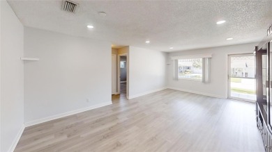Spacious 2/2 Montgomery Model Villa with 2-Car Garage in on On Top of the World Golf Course in Florida - for sale on GolfHomes.com, golf home, golf lot