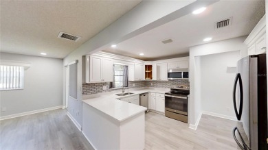 Spacious 2/2 Montgomery Model Villa with 2-Car Garage in on On Top of the World Golf Course in Florida - for sale on GolfHomes.com, golf home, golf lot