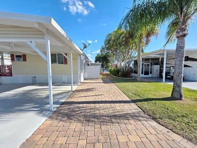 BLUE CYPRESS  - 2/2 updated well-maintained home. Two master on Blue Cypress Golf and RV Resort in Florida - for sale on GolfHomes.com, golf home, golf lot