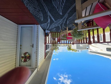 BLUE CYPRESS  - 2/2 updated well-maintained home. Two master on Blue Cypress Golf and RV Resort in Florida - for sale on GolfHomes.com, golf home, golf lot