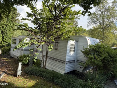 VACANT RV Lot in the sought after Outdoor Resorts at Gatlinburg on Bent Creek Golf Course in Tennessee - for sale on GolfHomes.com, golf home, golf lot