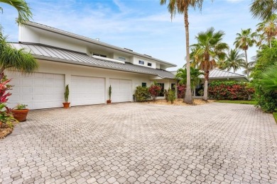 Estate Sale -- Nestled on a large, private cul-de-sac lot of on Sailfish Point Golf Club, Inc. in Florida - for sale on GolfHomes.com, golf home, golf lot