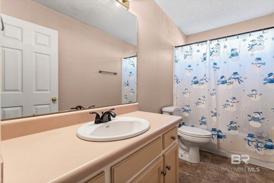 This wonderful traditional home is located in the Lake Forest on Lake Forest Yacht and Country Club in Alabama - for sale on GolfHomes.com, golf home, golf lot