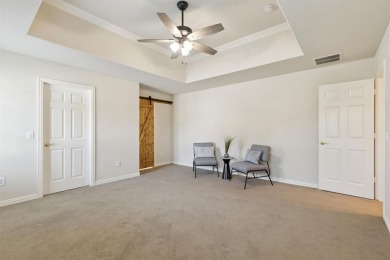 Nestled in a beautifully landscaped setting and shaded by mature on Wildhorse Golf Club of Robson Ranch in Texas - for sale on GolfHomes.com, golf home, golf lot