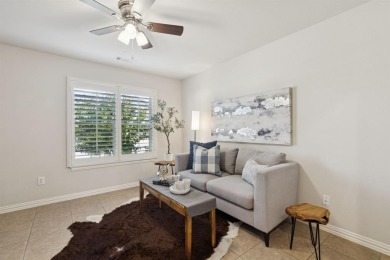 Nestled in a beautifully landscaped setting and shaded by mature on Wildhorse Golf Club of Robson Ranch in Texas - for sale on GolfHomes.com, golf home, golf lot
