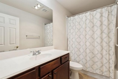 Nestled in a beautifully landscaped setting and shaded by mature on Wildhorse Golf Club of Robson Ranch in Texas - for sale on GolfHomes.com, golf home, golf lot