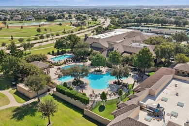 Nestled in a beautifully landscaped setting and shaded by mature on Wildhorse Golf Club of Robson Ranch in Texas - for sale on GolfHomes.com, golf home, golf lot