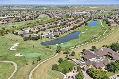 Nestled in a beautifully landscaped setting and shaded by mature on Wildhorse Golf Club of Robson Ranch in Texas - for sale on GolfHomes.com, golf home, golf lot