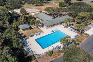 Welcome to 487 Lantana Circle, a stunning Lowcountry home on DeBordieu Country Club in South Carolina - for sale on GolfHomes.com, golf home, golf lot