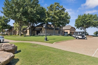 Nestled in a beautifully landscaped setting and shaded by mature on Wildhorse Golf Club of Robson Ranch in Texas - for sale on GolfHomes.com, golf home, golf lot