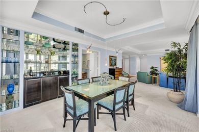 Enjoy panoramic Golf course views from the large screened lanai on Club at Pelican Bay Golf Course in Florida - for sale on GolfHomes.com, golf home, golf lot