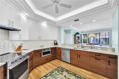 Enjoy panoramic Golf course views from the large screened lanai on Club at Pelican Bay Golf Course in Florida - for sale on GolfHomes.com, golf home, golf lot