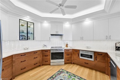 Enjoy panoramic Golf course views from the large screened lanai on Club at Pelican Bay Golf Course in Florida - for sale on GolfHomes.com, golf home, golf lot