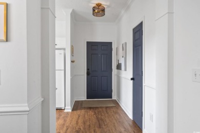 Don't hesitate to view this amazing top-floor end unit, it is on Barefoot Resort and Golf Club  in South Carolina - for sale on GolfHomes.com, golf home, golf lot